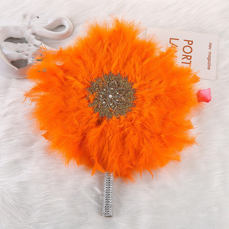 African Wedding Bride And Bridesmaid Holding A Big Round Feather Fan